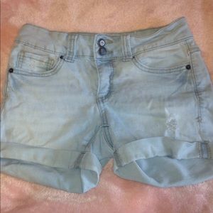 Light wash denim shorts.